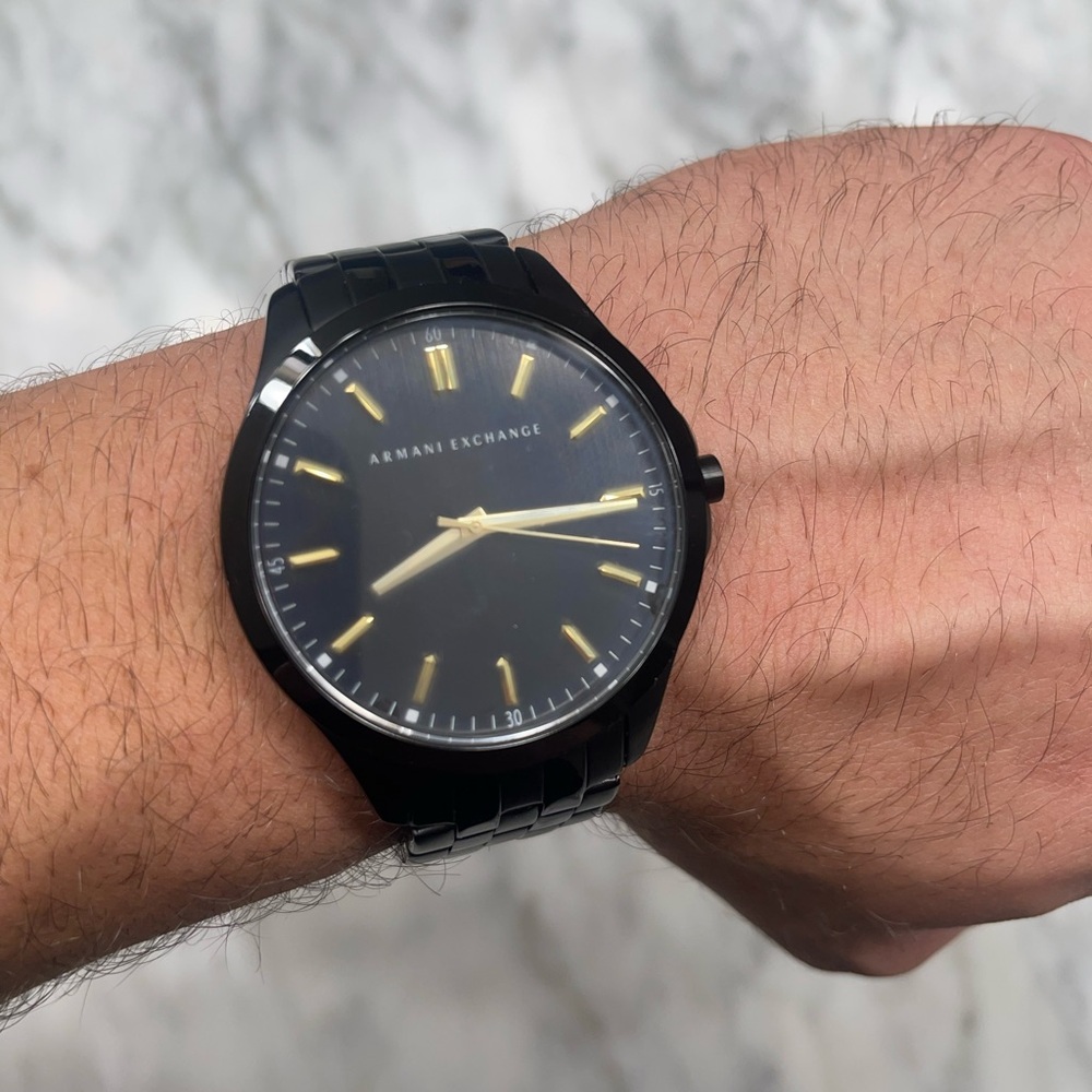 Armani Exchange black and gold men’s watch